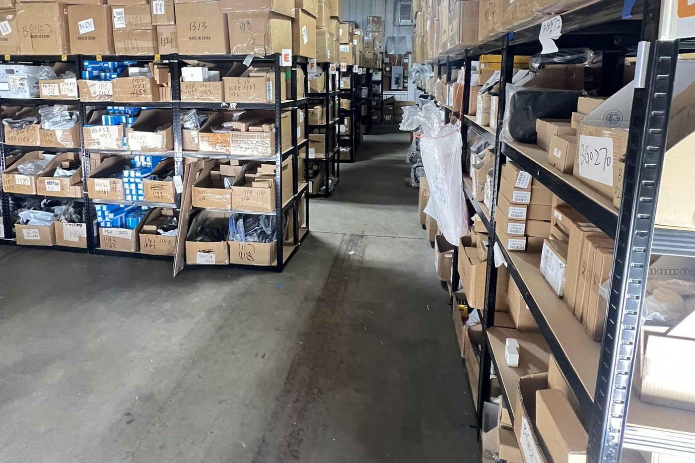 Shelving runs and picking aisle inside the warehouse